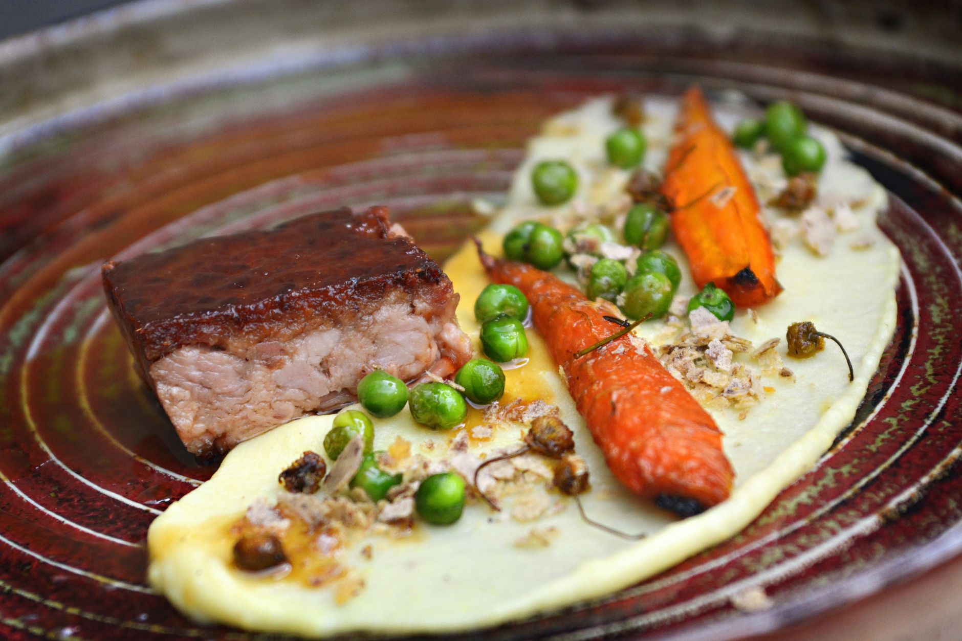 Braised Pork Belly with Creamy Carrot and Pea Purée