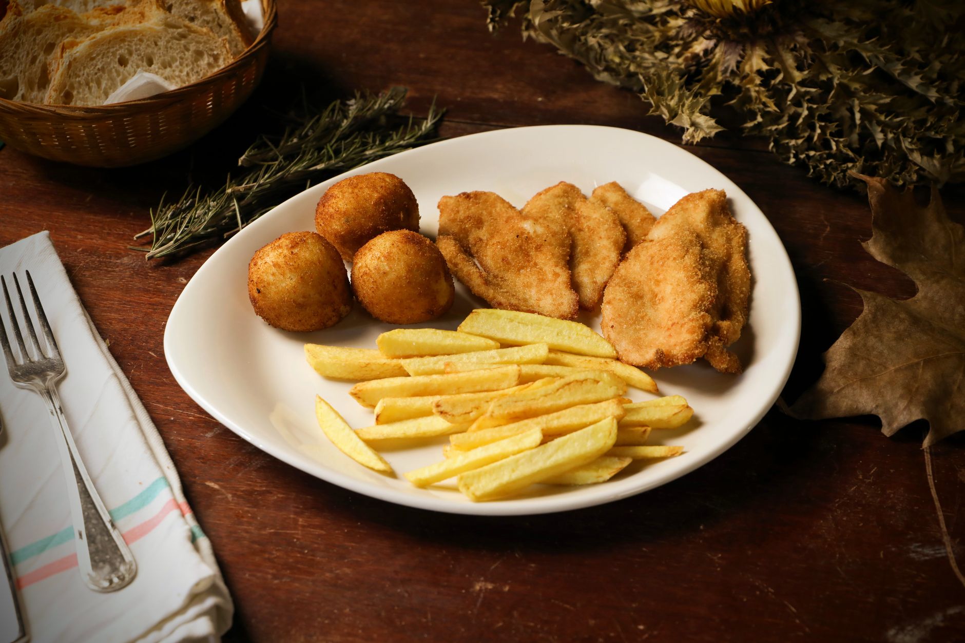 Breaded Chicken Cutlet with Fries and Potato Dumplings