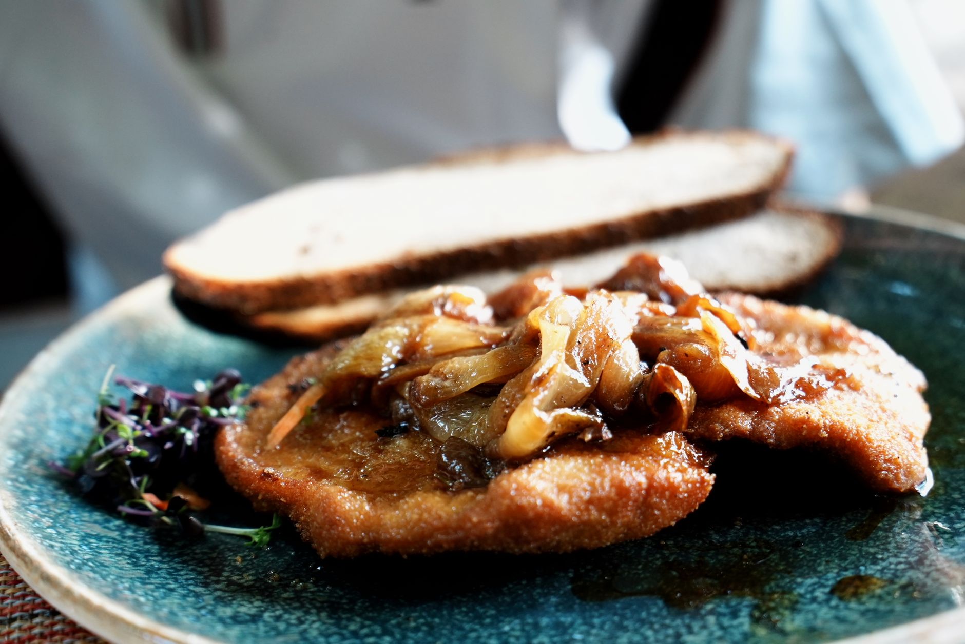 Breaded Veal Cutlet With Onions