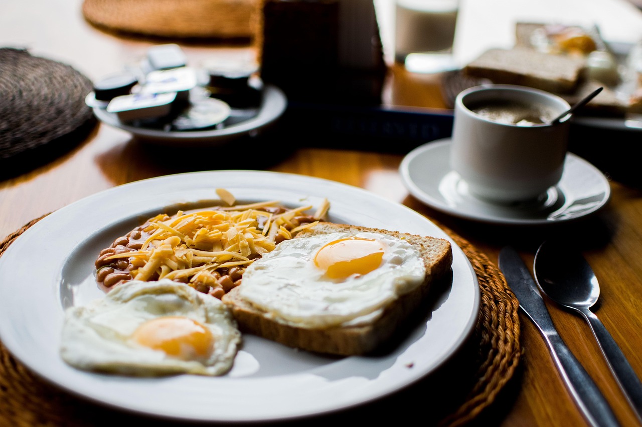 Breakfast Plate with Fried Eggs, Toast, and Beans
