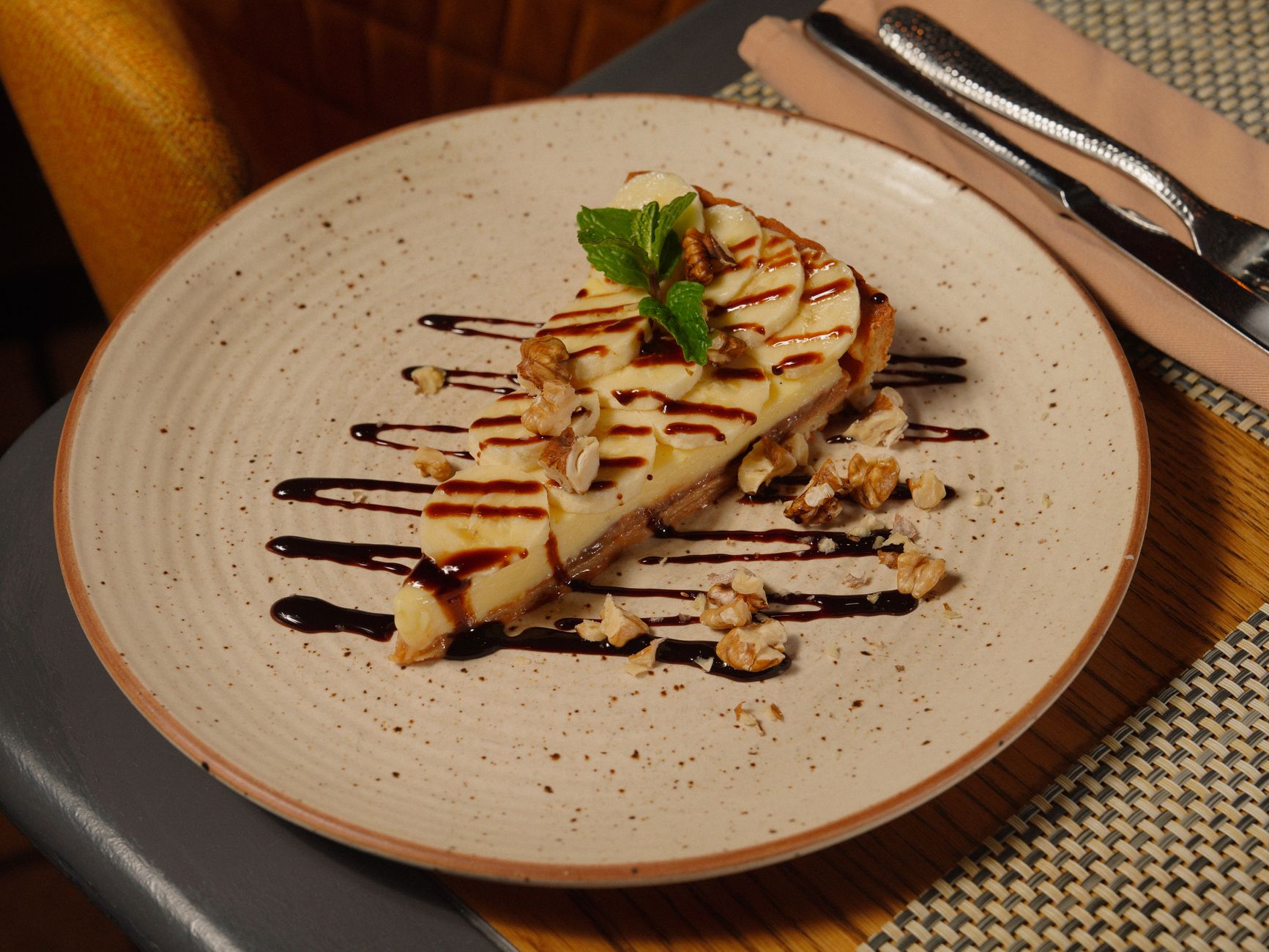 Cheesecake with Caramel Drizzle and Nuts