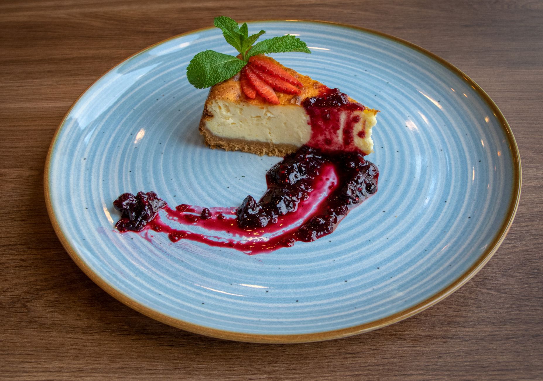 Cheesecake with Strawberry and Raspberry Sauce