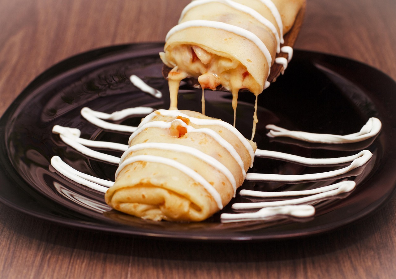 Cheesy Crepes with White Sauce