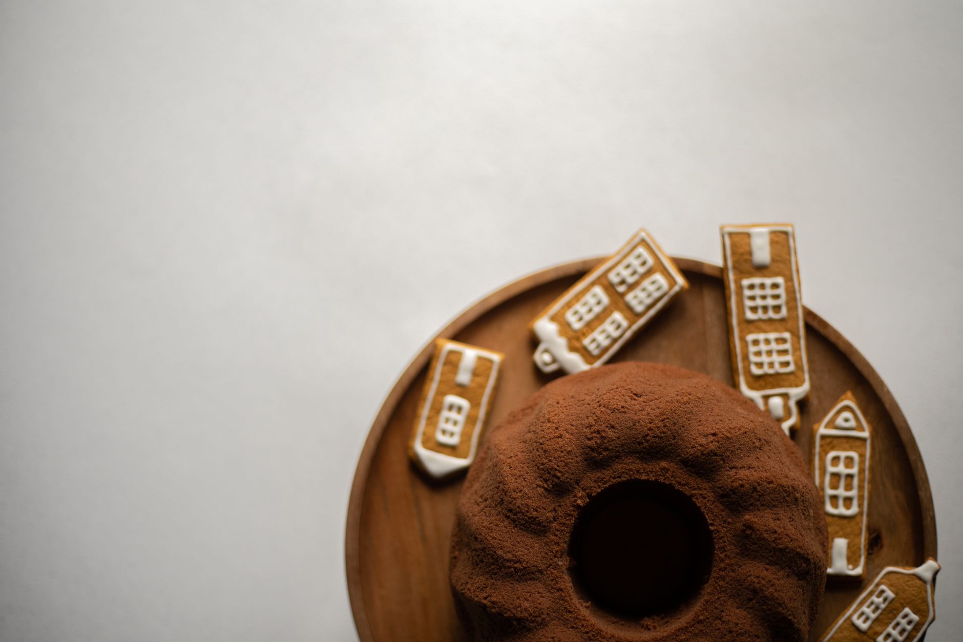 Chocolate Bundt Cake with Gingerbread House Decorations
