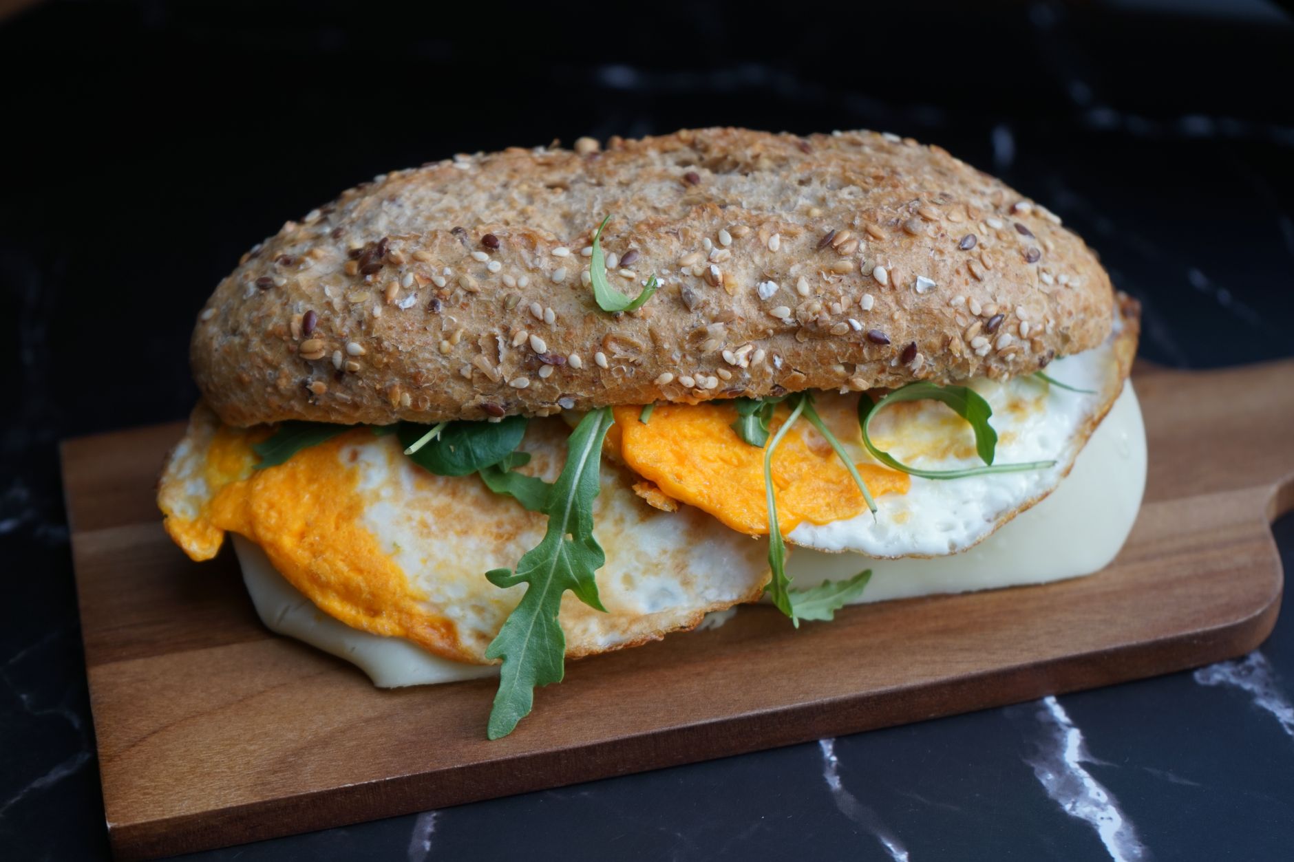 Egg and Arugula Bagel Sandwich