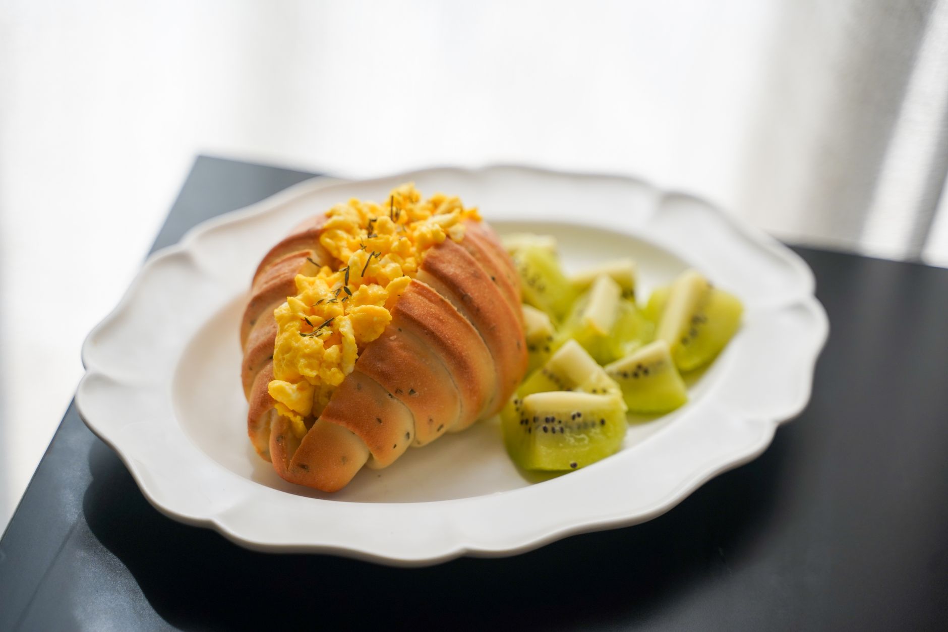 Egg-Topped Croissant with Kiwi
