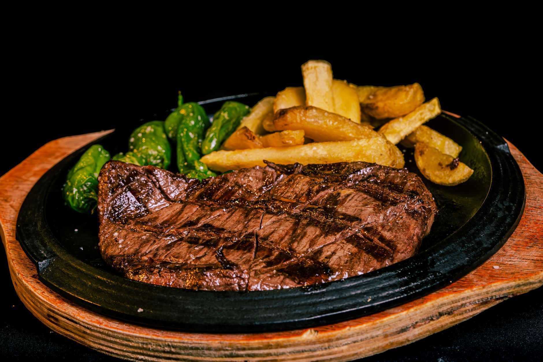 Grilled Beef Steak with Fries and Peppers