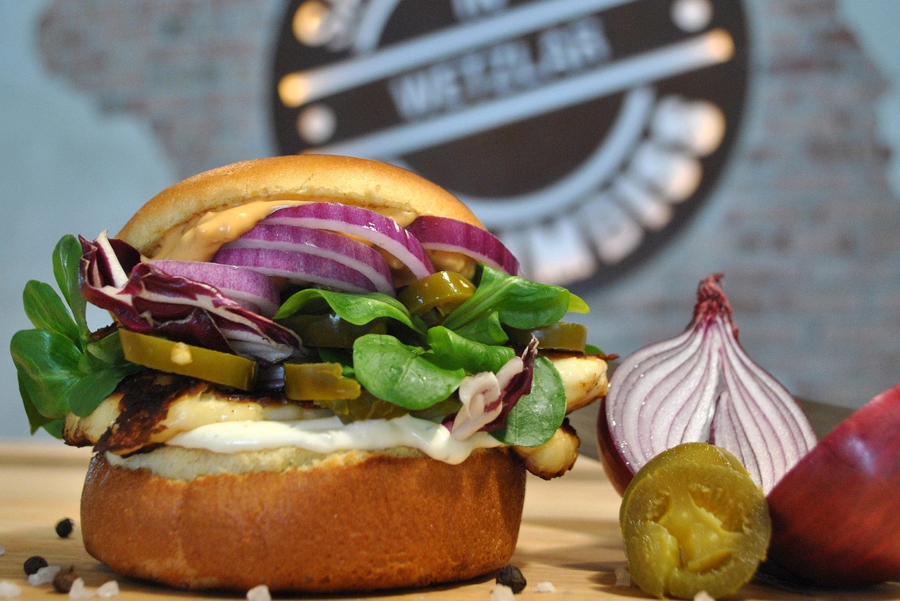 Grilled Chicken Burger with Red Onion and Arugula
