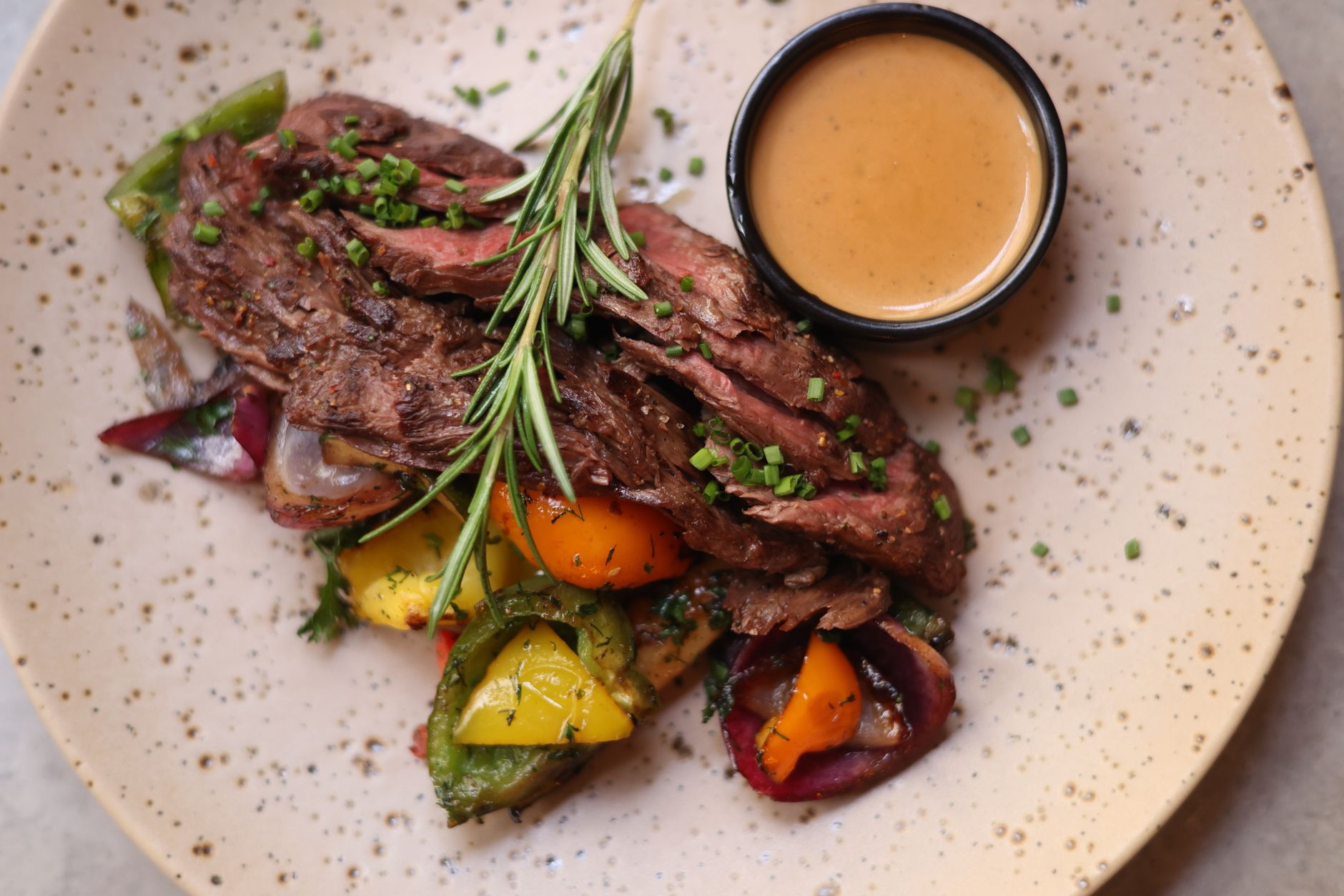Grilled Flank Steak with Roasted Vegetables and Sauce