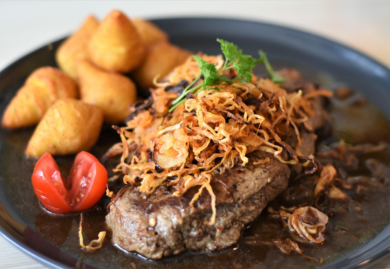 Grilled Steak with Onions and Sauce