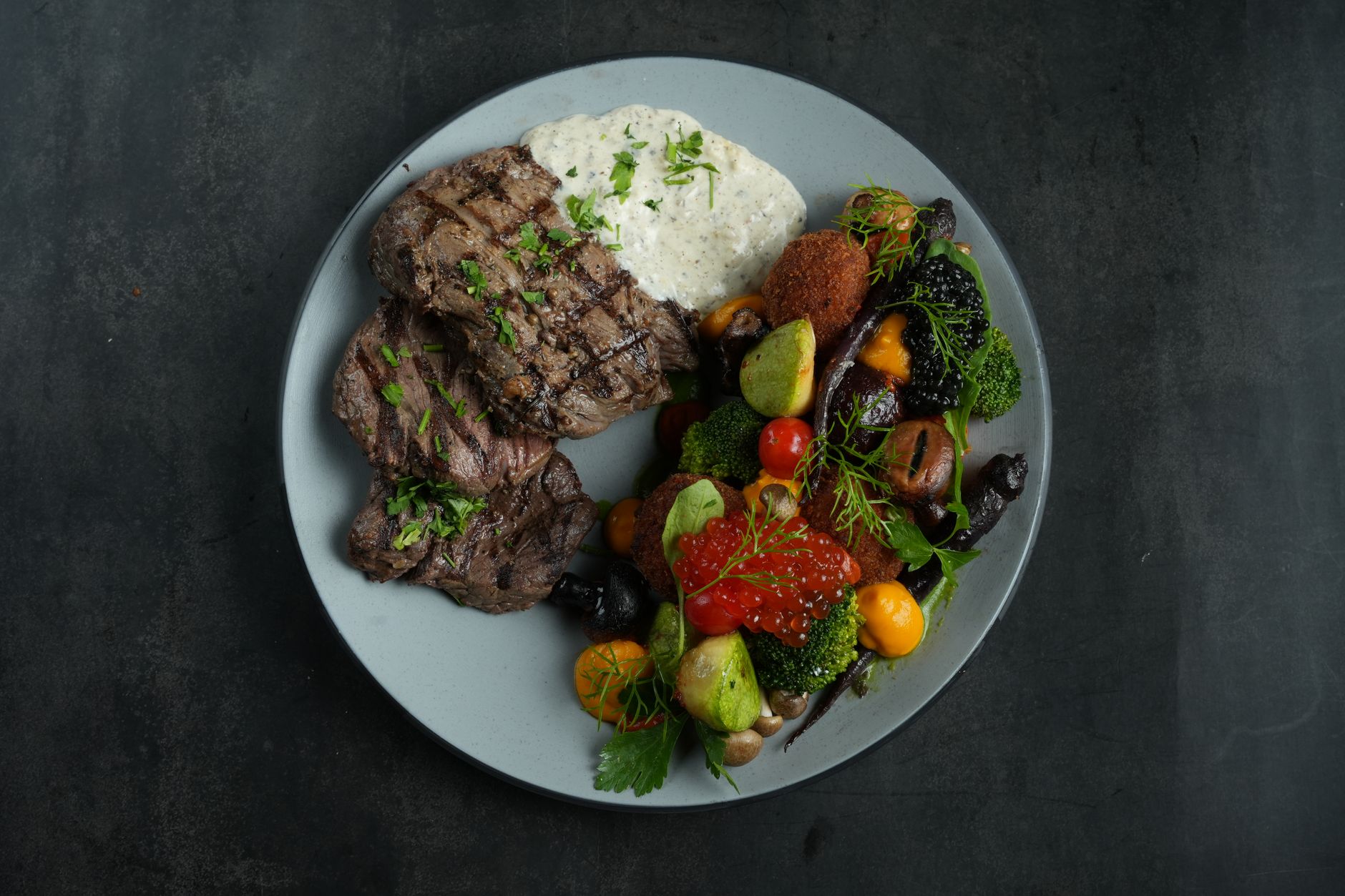 Grilled Steak with Roasted Vegetables and Herb Cream