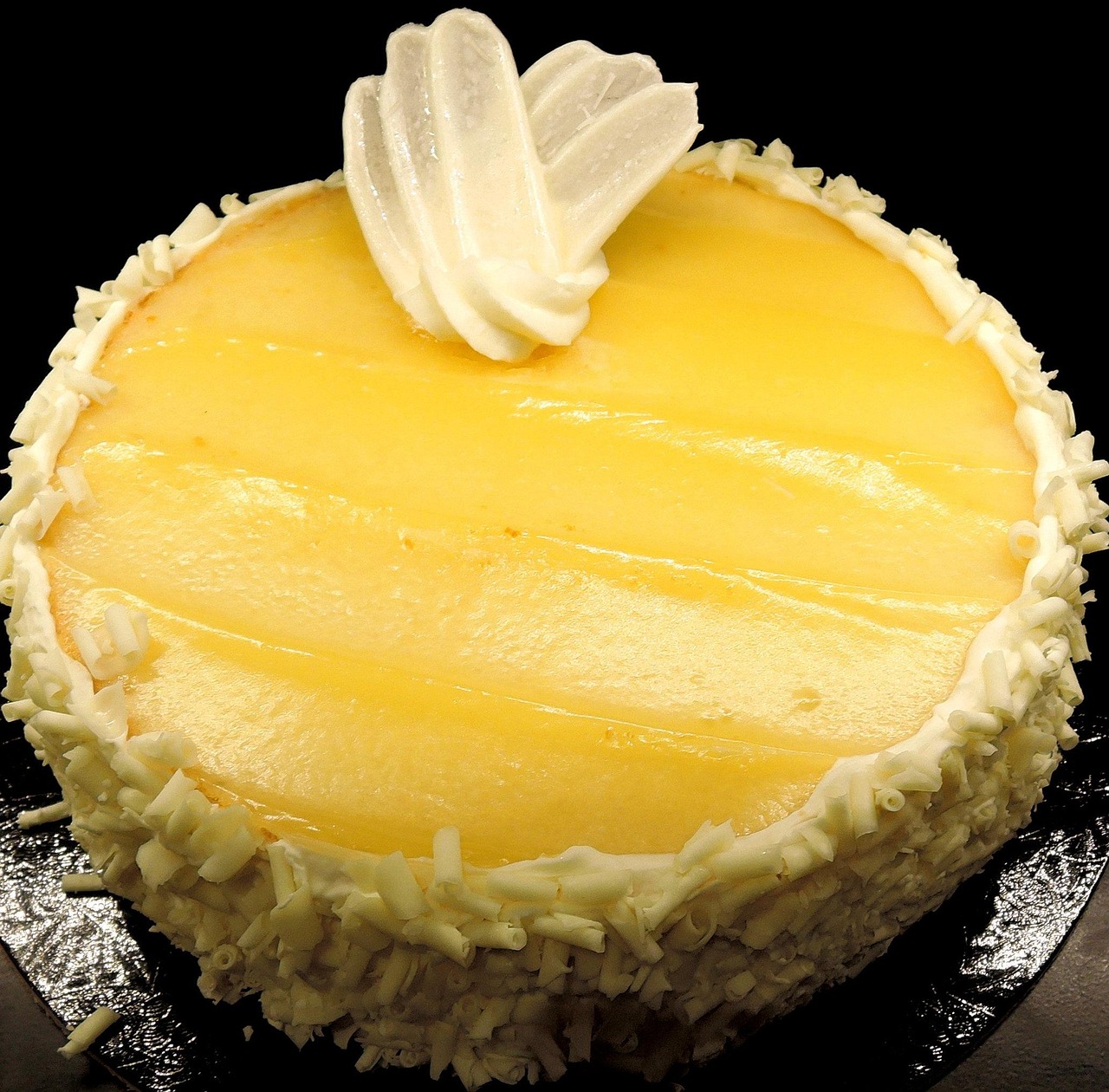 Mango Mousse Cake with White Chocolate Shavings