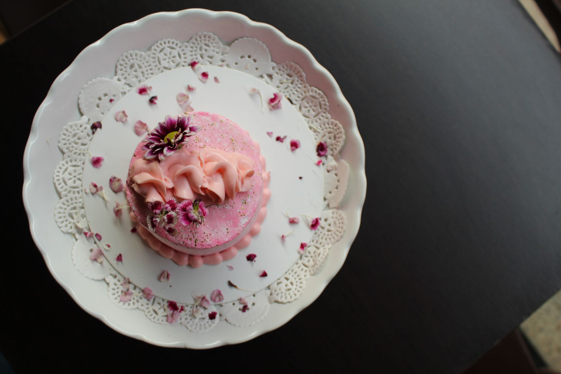 Mini Pink Frosted Cake with Edible Flowers
