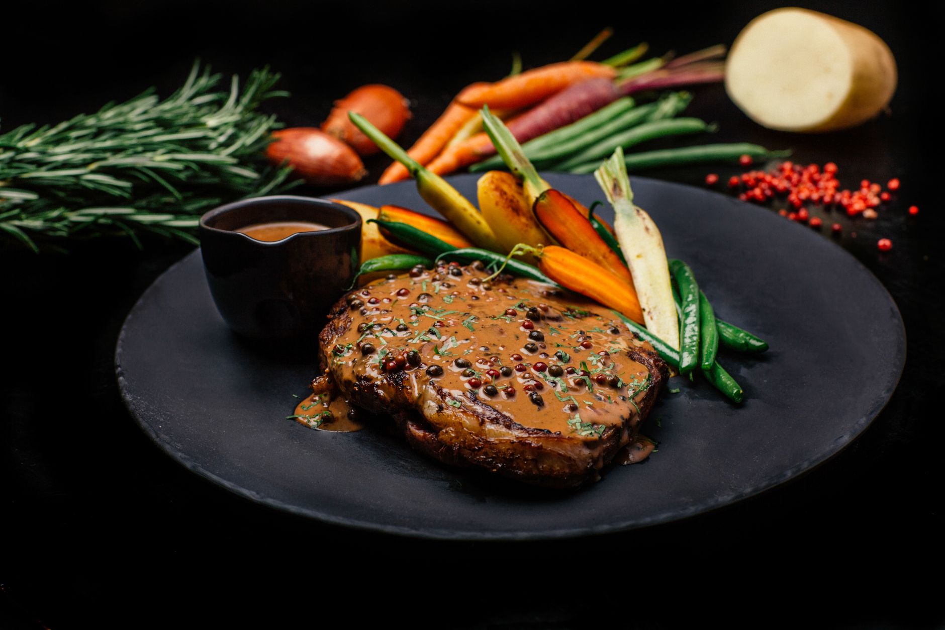 Pan-Seared Steak with Herb Sauce and Roasted Vegetables