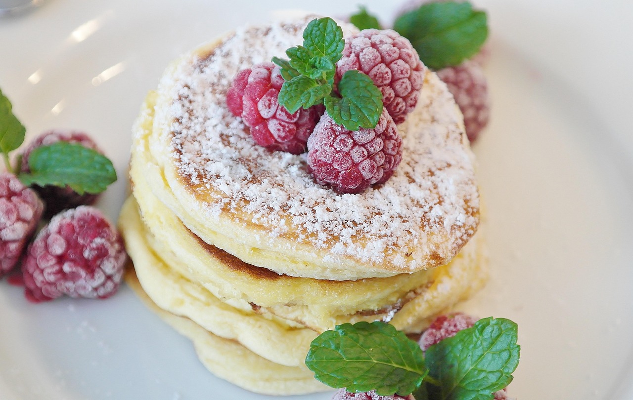Pancakes with Berries and Powdered Sugar