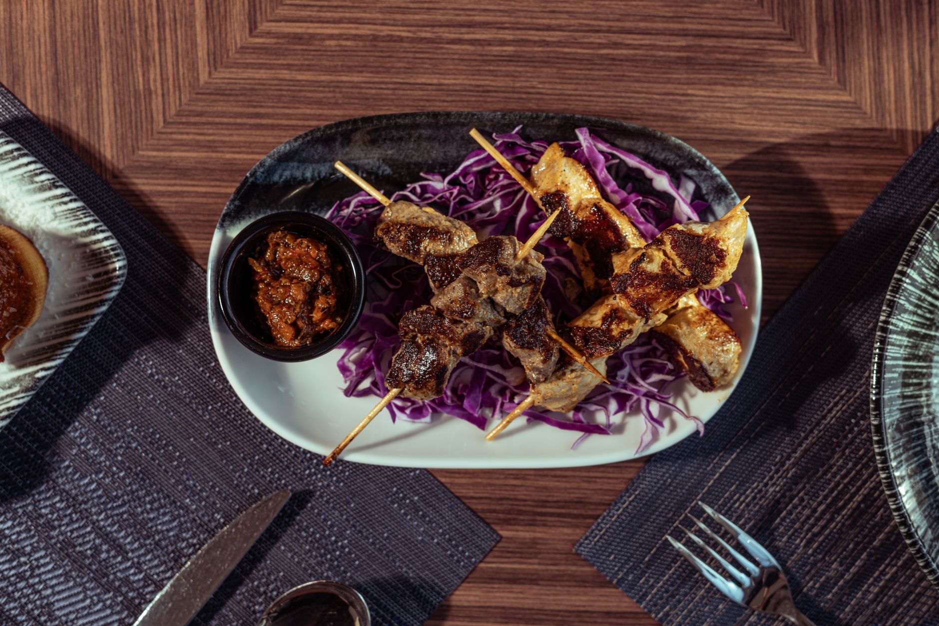 Satay with Peanut Sauce and Purple Cabbage