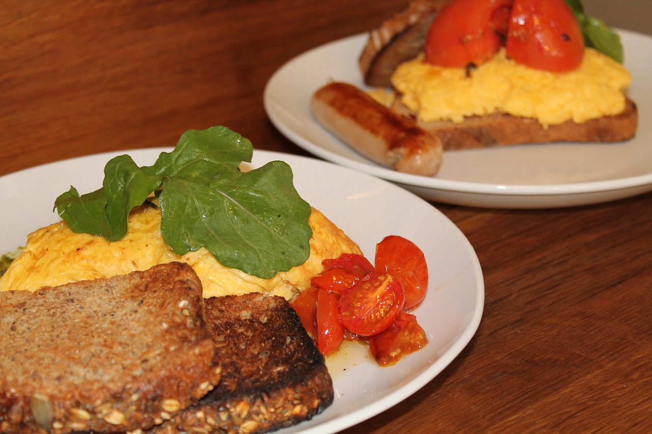 Scrambled Eggs on Toast with Sausage and Tomatoes