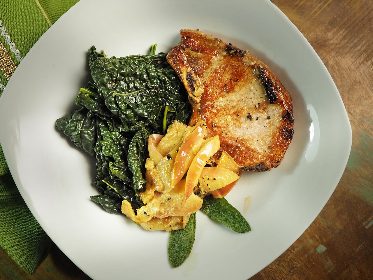 Skillet Pork Chops with Apples and Kale