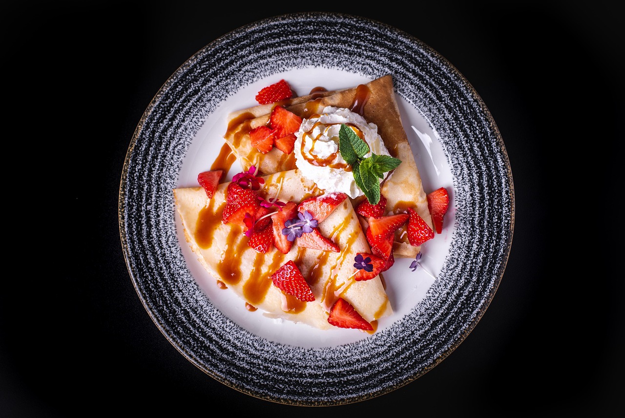 Swedish Pancakes with Strawberries and Syrup