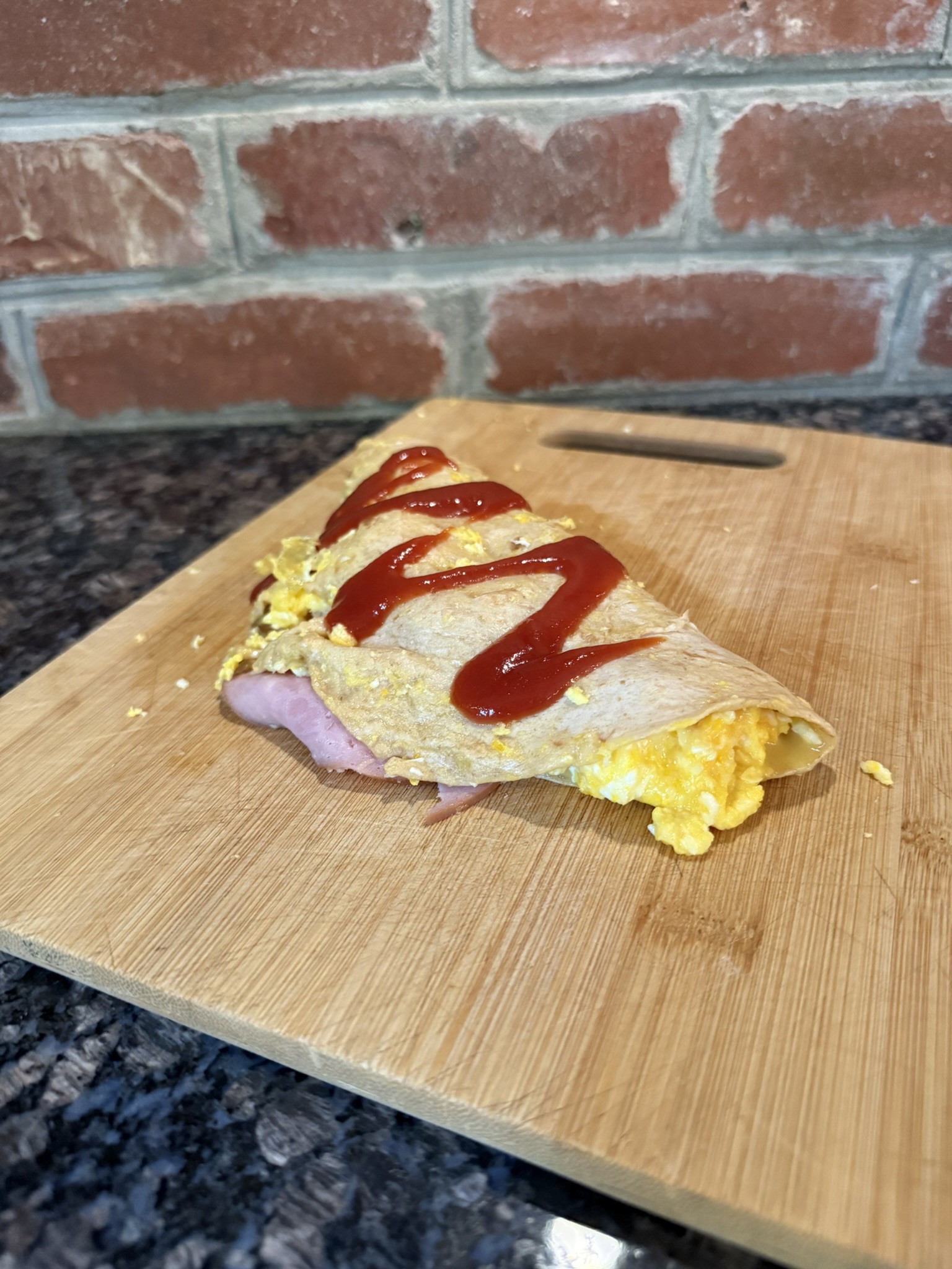 Ham, Egg & Cheese Breakfast Quesadilla with Ketchup Drizzle