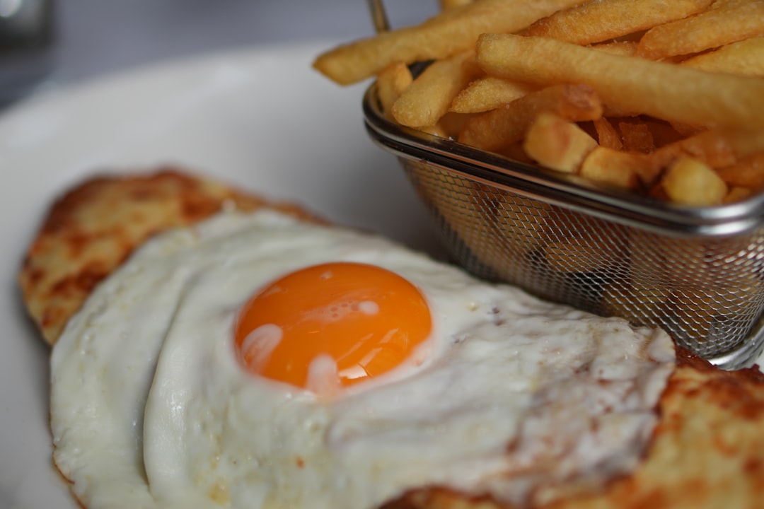 Crispy Bacon-Cheese Pork Schnitzel with Fries & Egg