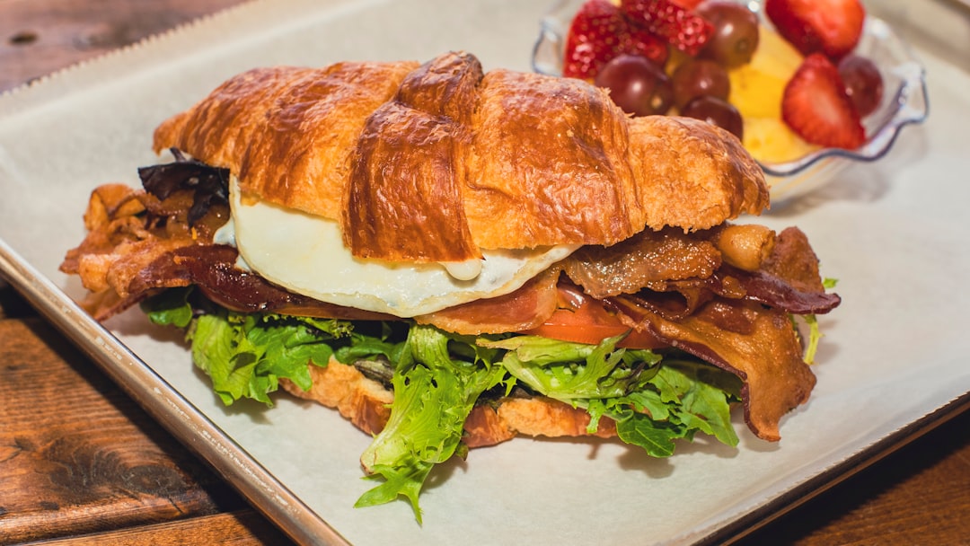 Bacon Egg & Cheese Croissant with Fruit