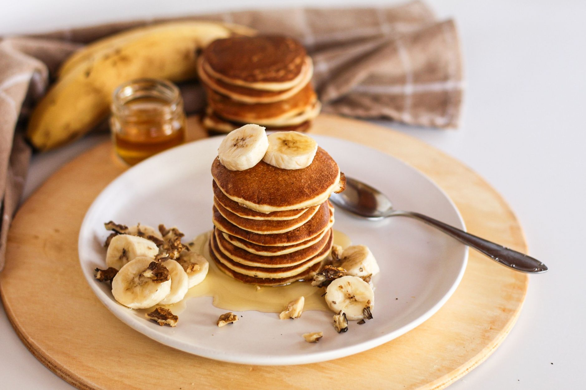 Banana Walnut Protein Pancakes with Honey