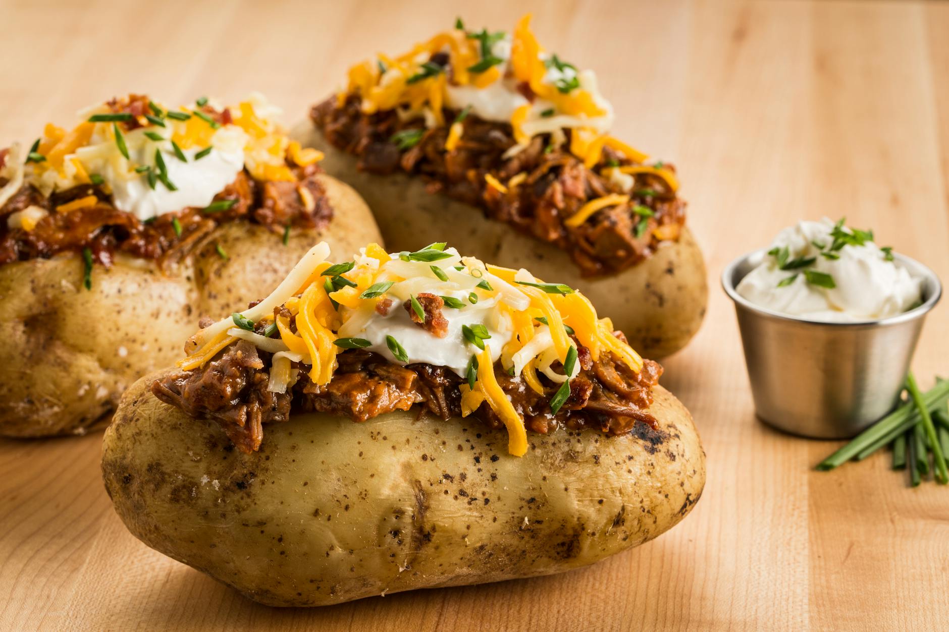 BBQ Brisket Stuffed Potato with Crispy Cheese