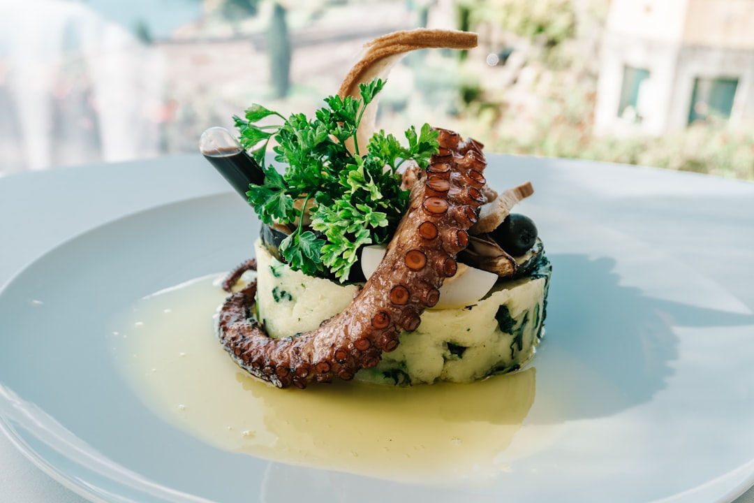 Charred Octopus with Herbed Potatoes & Olives