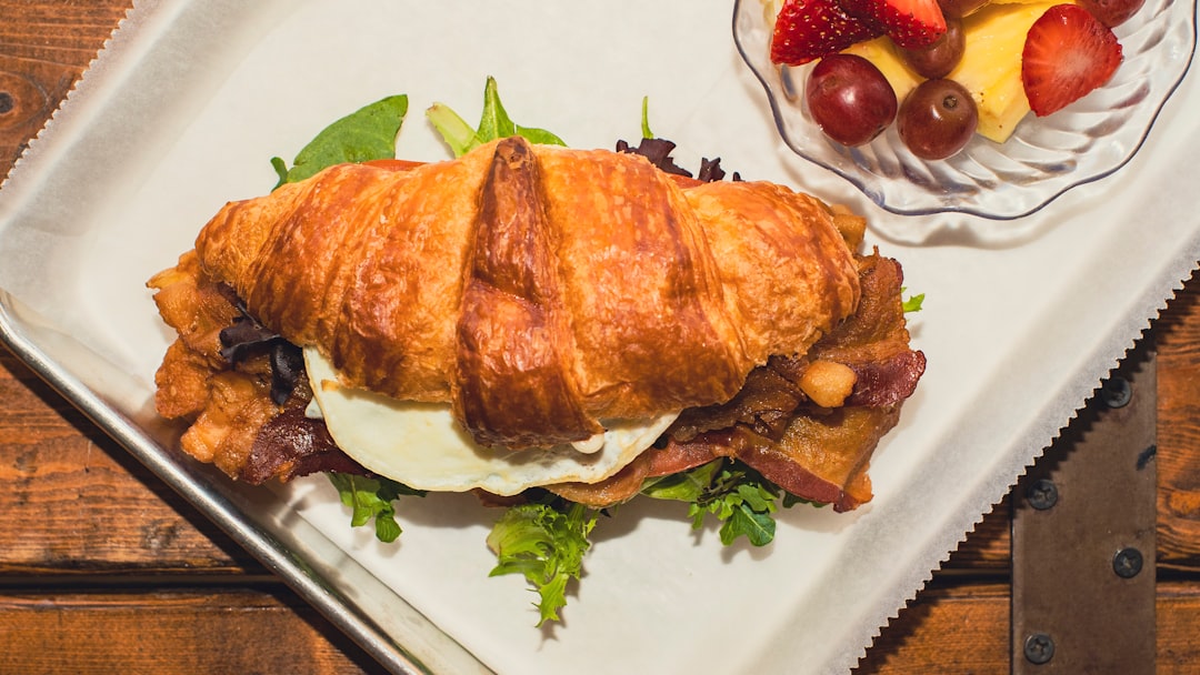 Crispy Bacon Egg & Cheese Croissant with Fruit