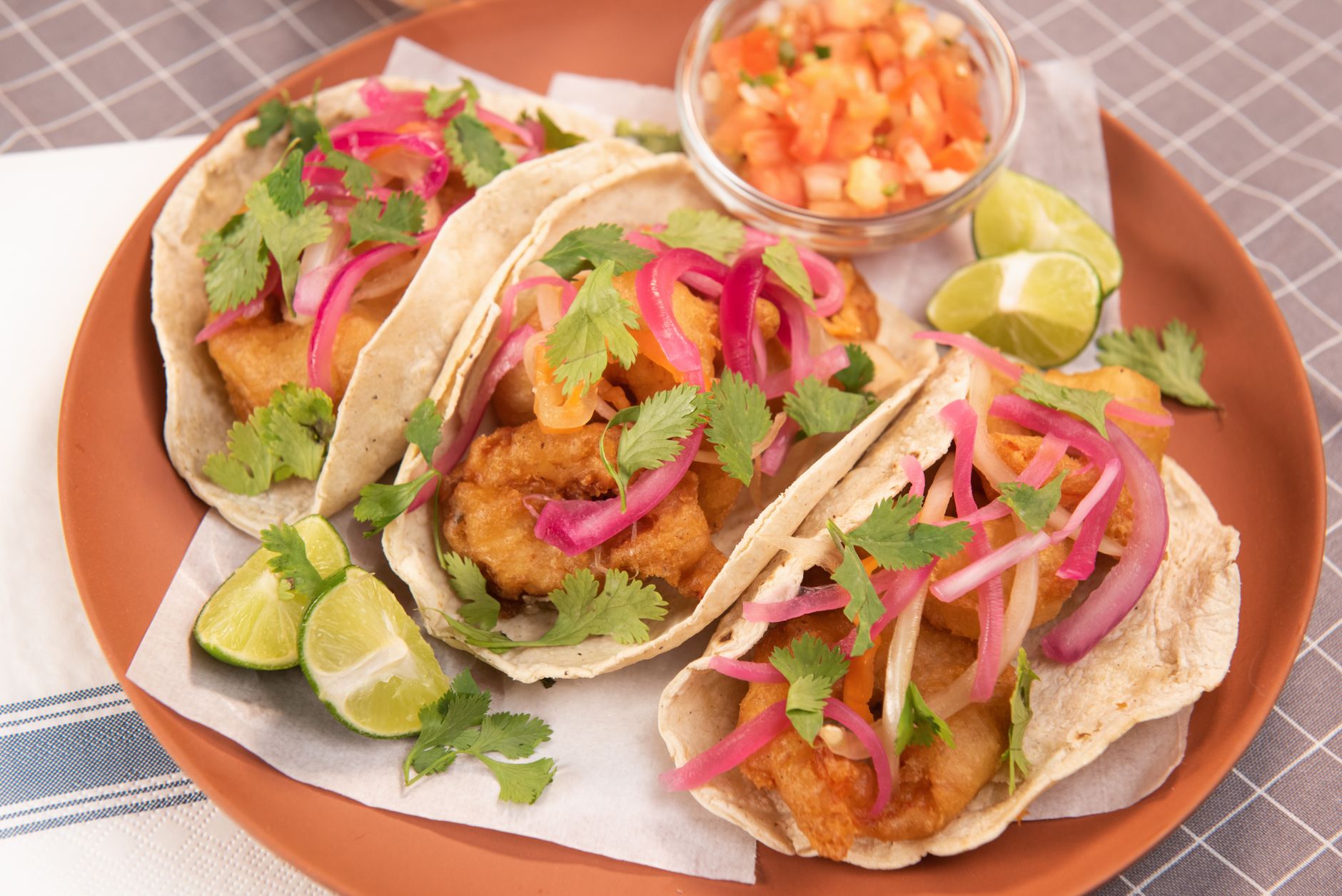 Crispy Fish Tacos with Lime Crema & Slaw