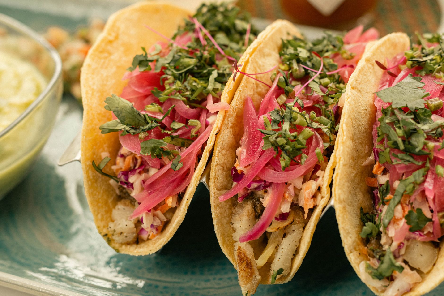 Crispy Fish Tacos with Slaw & Lime Crema