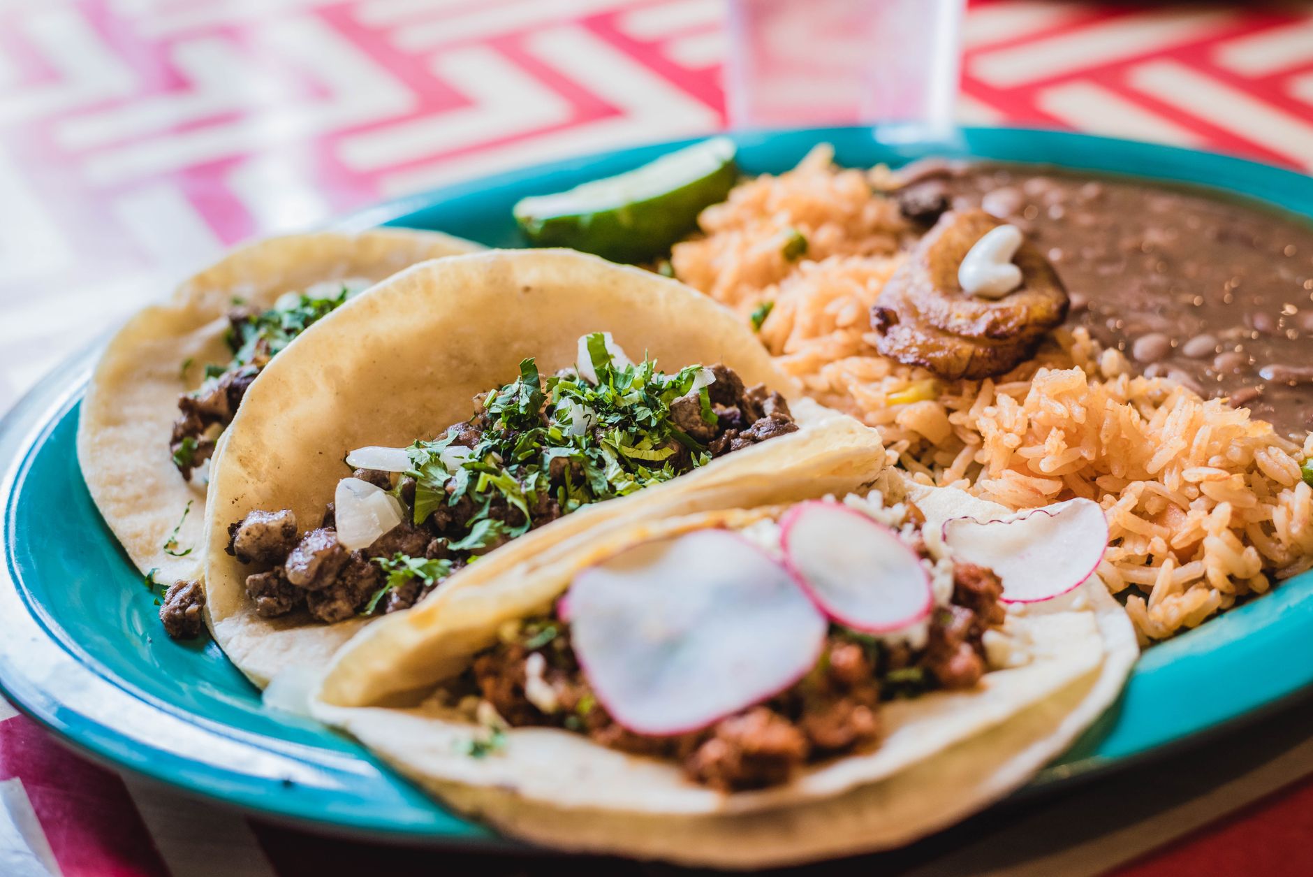 Crispy Pork Tacos with Rice & Beans
