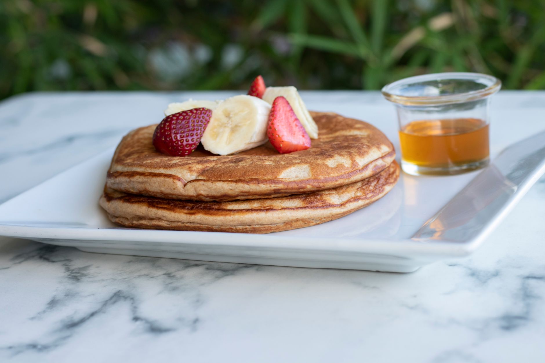 Fluffy Banana-Oat Pancakes with Berries & Maple