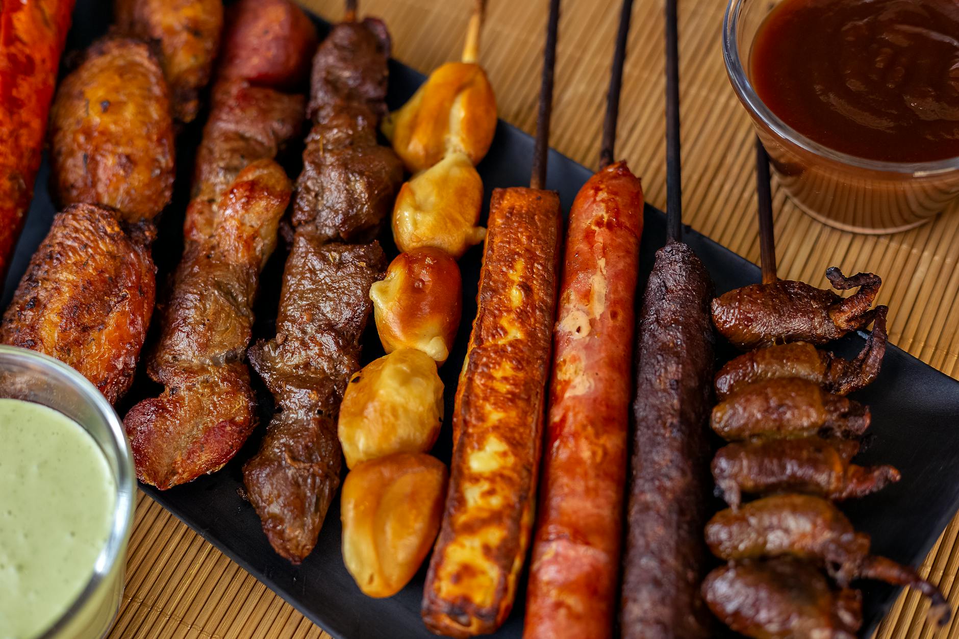Grilled Beef Anticuchos with Crispy Potatoes & Sauces