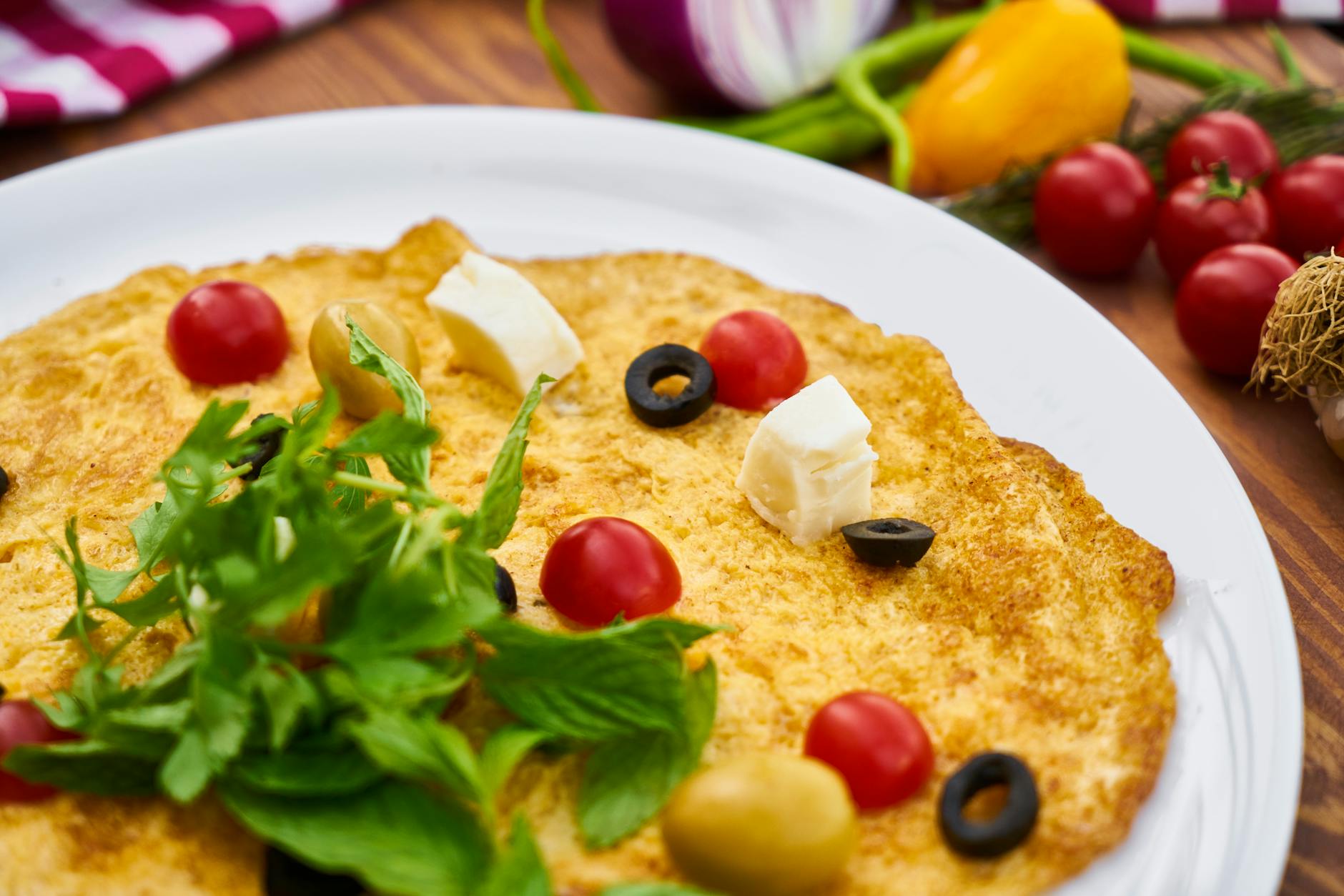 Herby Feta Omelette with Warm Tomato Salad