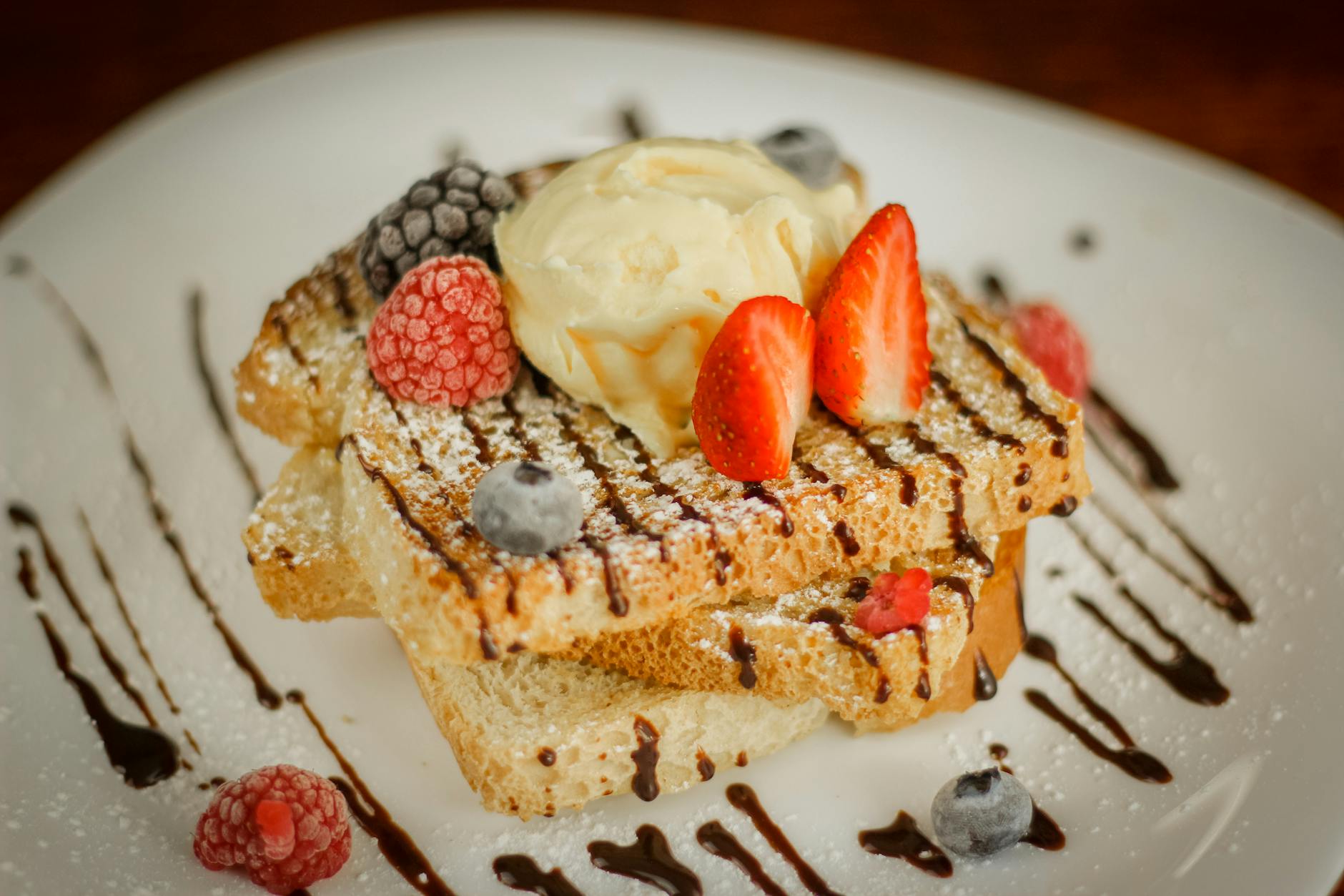 Stuffed Strawberry French Toast with Berry Compote