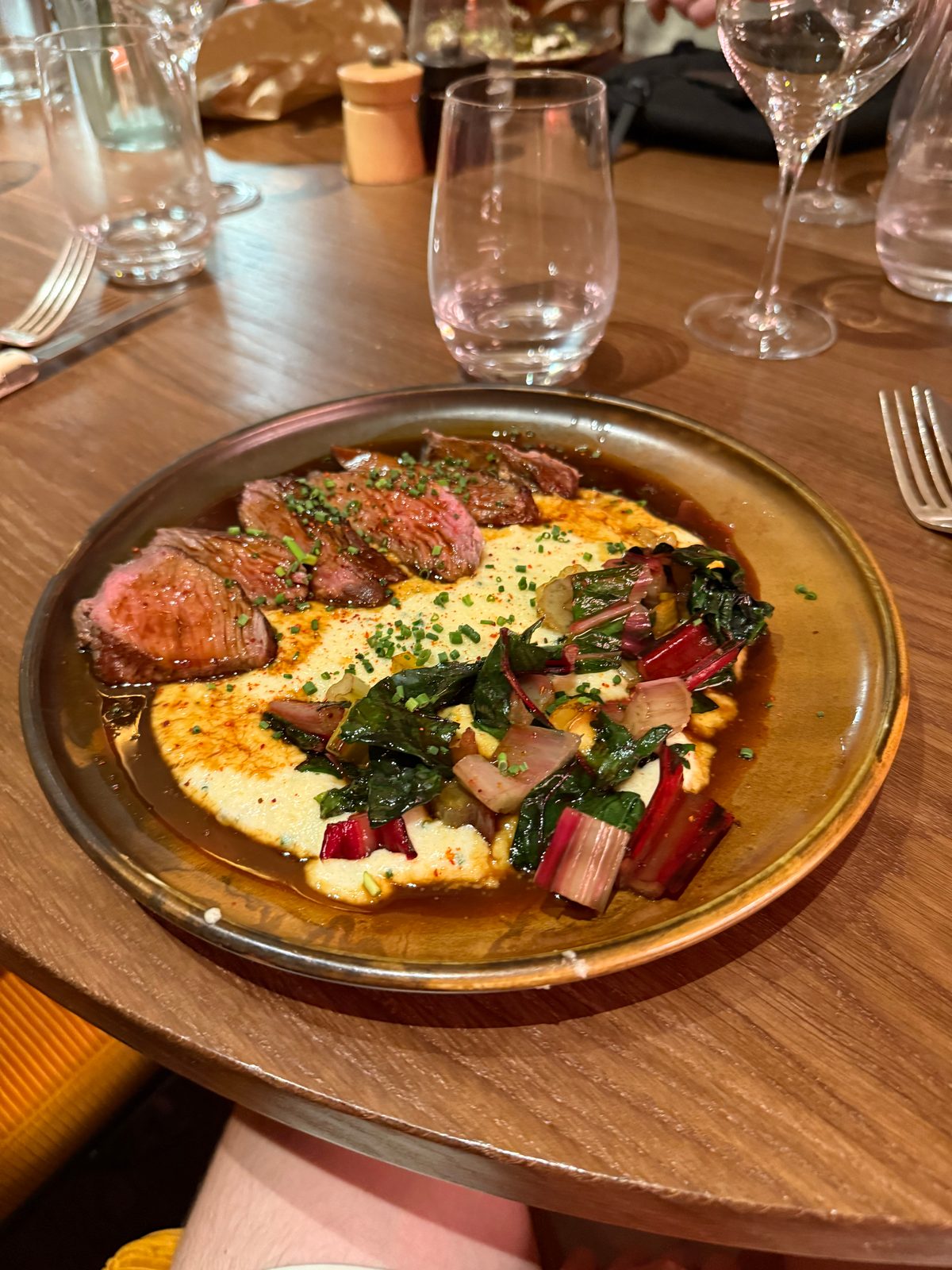 Sliced Steak with Polenta and Chard