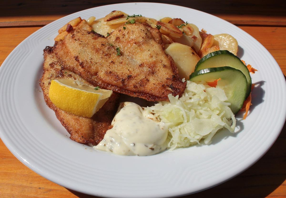 Breaded Fish Cutlet with Potatoes and Sauerkraut