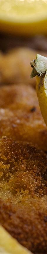 Breaded Veal Cutlet with French Fries and Lemon