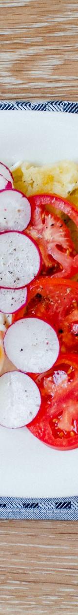 Breakfast Plate with Fried Egg, Potatoes, Tomatoes, and Radishes