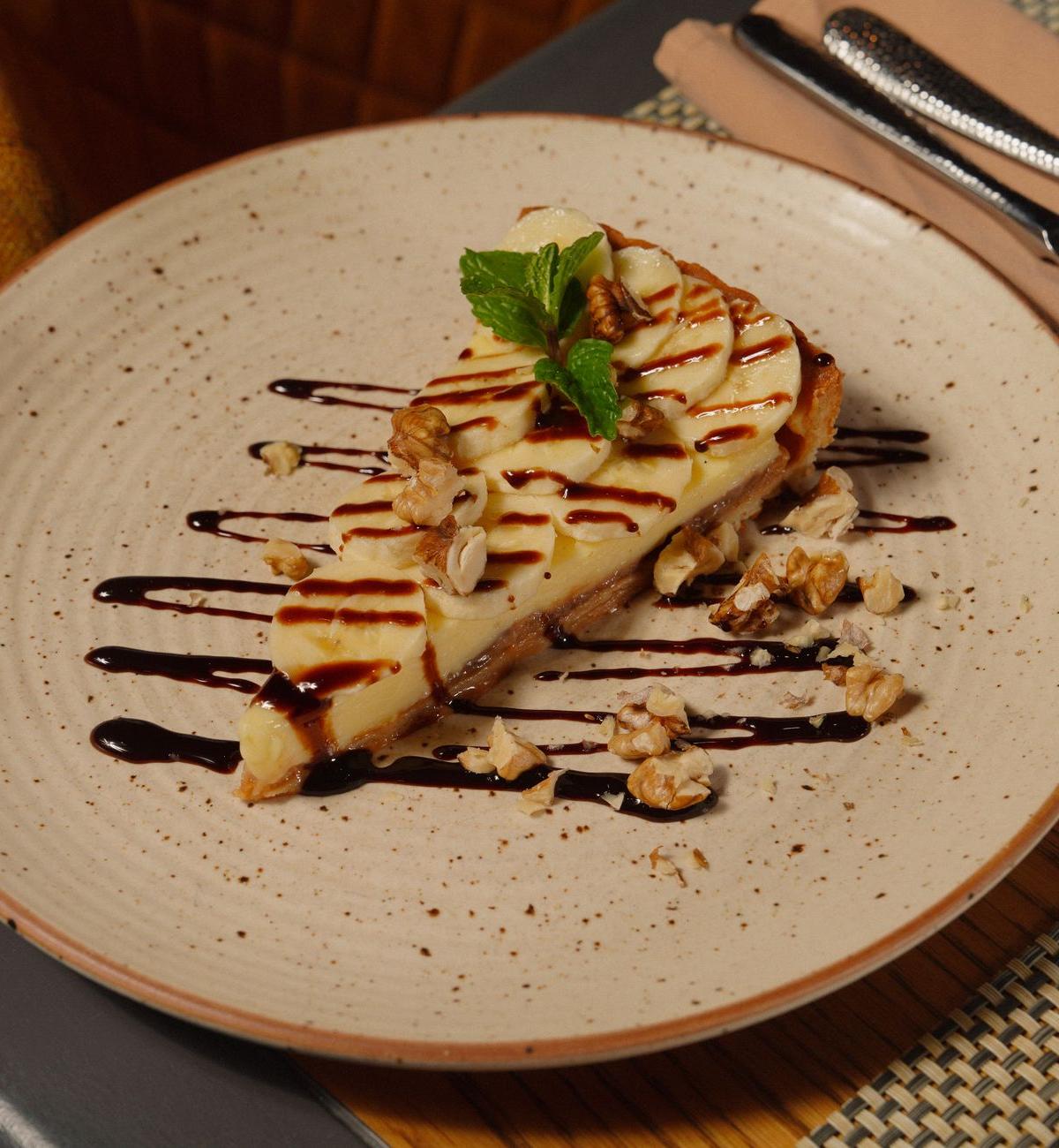 Cheesecake with Caramel Drizzle and Nuts