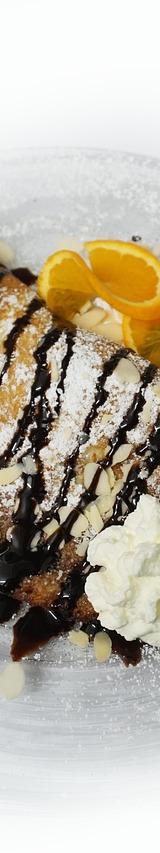 Chocolate Croissant with Whipped Cream and Orange Slices