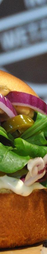 Grilled Chicken Burger with Red Onion and Arugula
