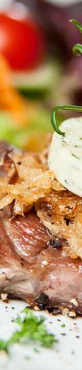 Grilled Steak with Herb Butter and Onions