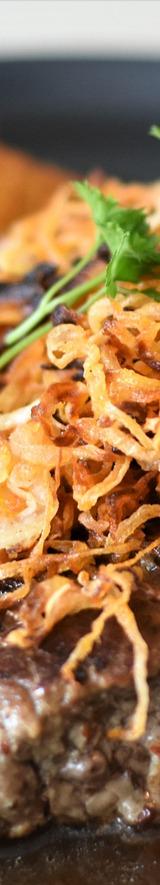 Grilled Steak with Onions and Sauce