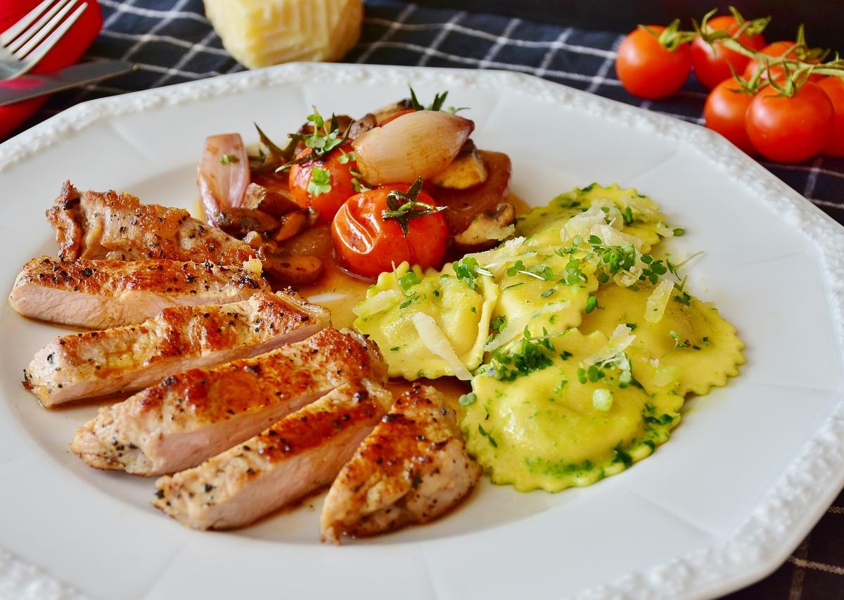 Pork Medallions with Herb Ravioli and Roasted Vegetables