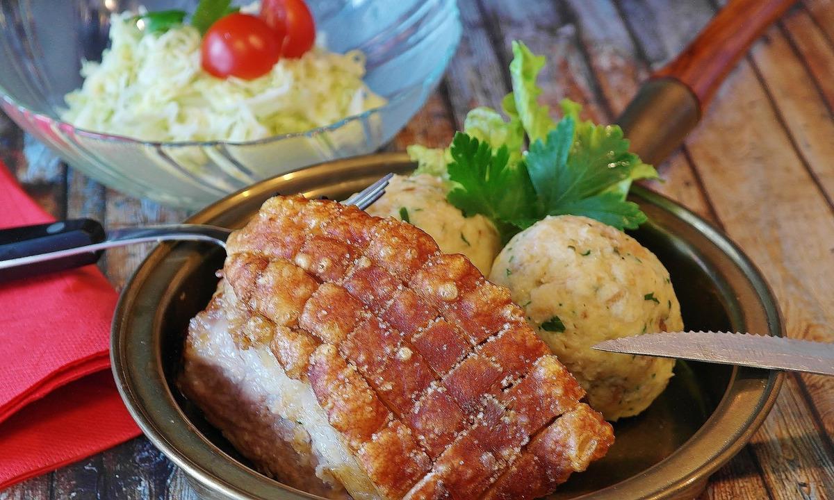 Roast Pork Knuckle with Potato Dumplings and Sauerkraut