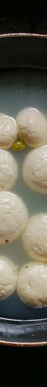 Rasgulla in Cardamom Syrup