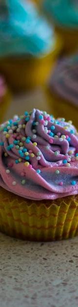 10-Minute Vanilla Cupcakes with Frosting & Sprinkles